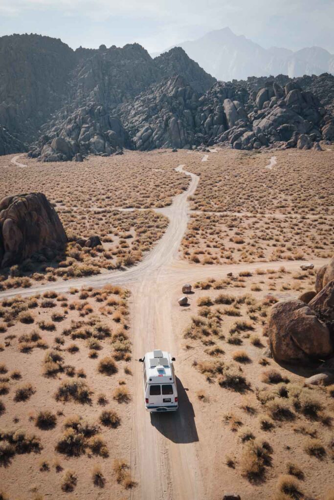 Van driving into Alabama Hills in southern california