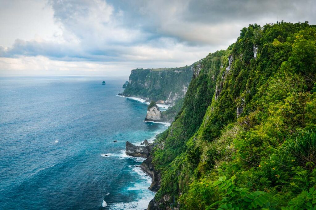 lush green cliffs of nusa penida