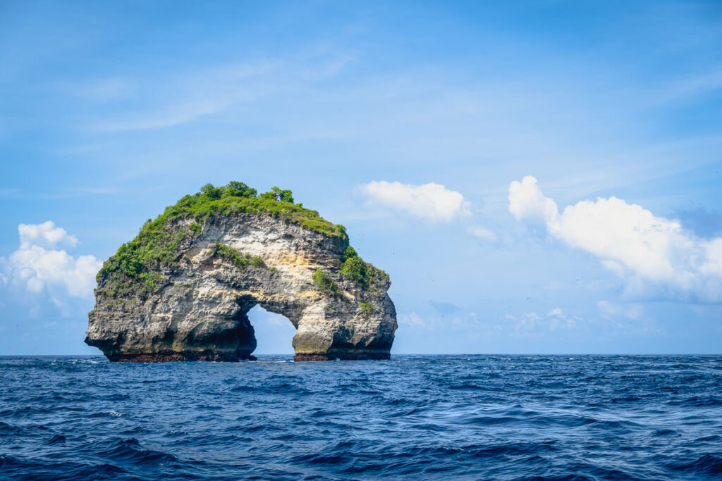 banah cliff stone archway from boat