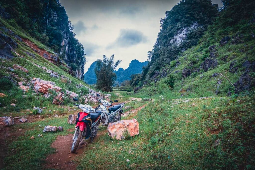 riding a motorbike around cao bang province, north vietnam