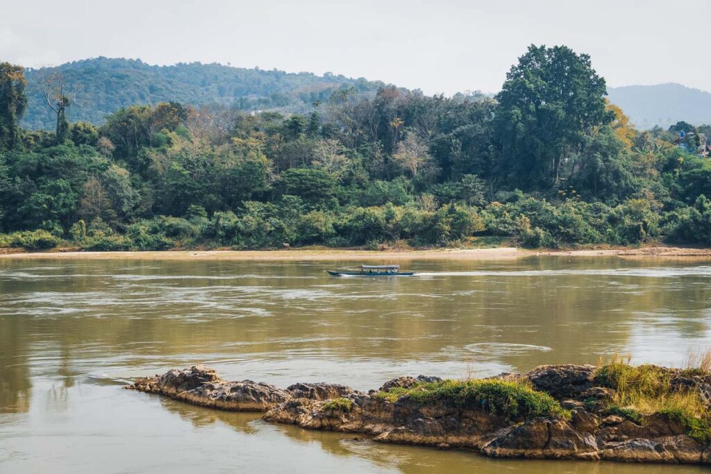 a boat ride on the mekong delta in the golden triangle thailand