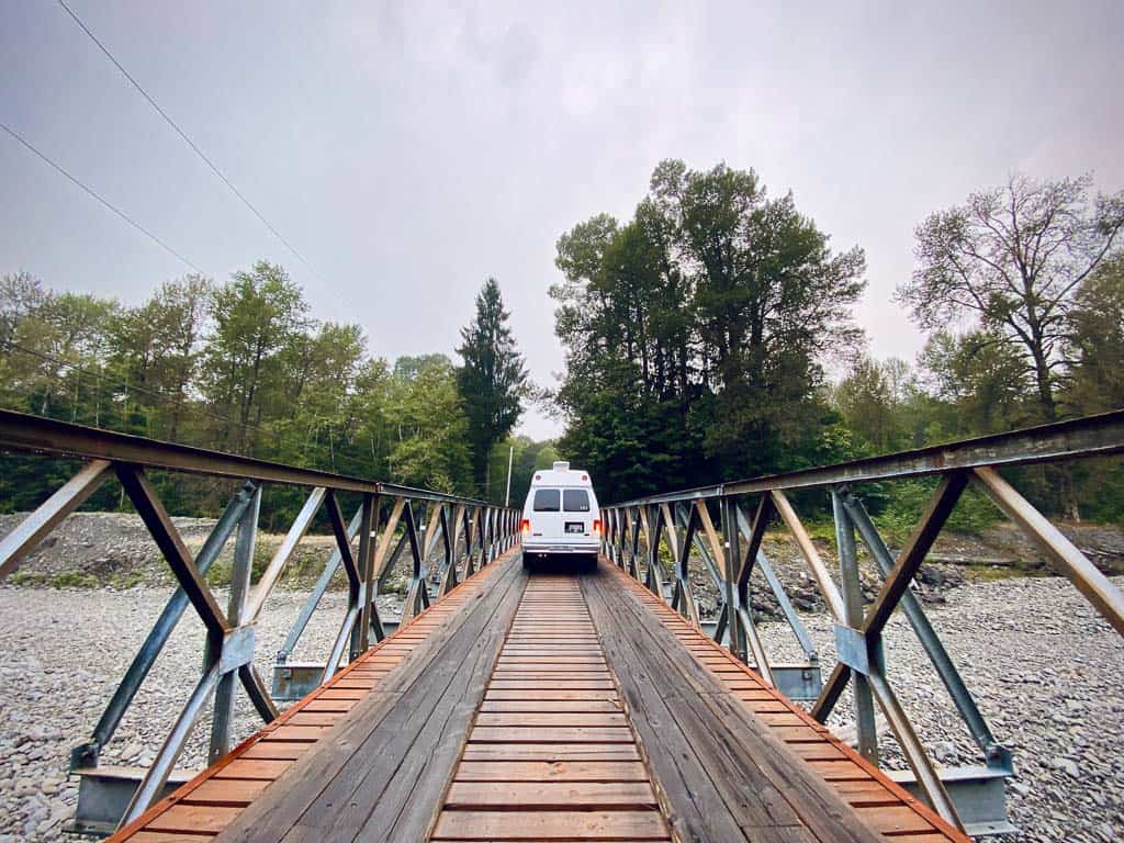 van driving on a bridge 