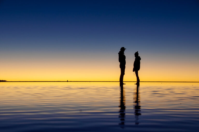 Silhouette of Salar de Uyuni at sunrise in Bolivia