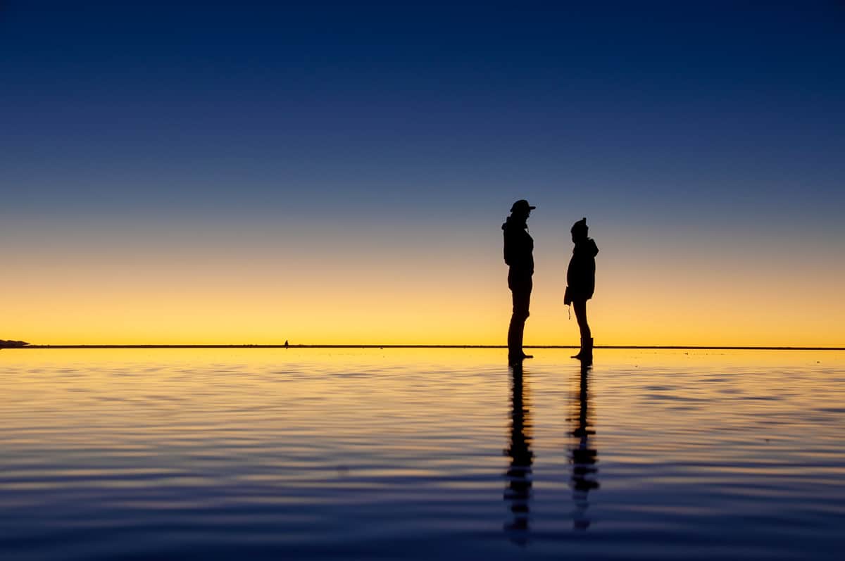 Silhouette of Salar de Uyuni at sunrise in Bolivia