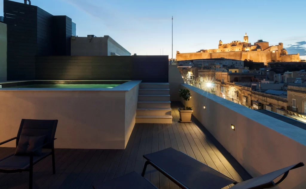 duke boutique hotel view of citadel and jacuzzi on patio