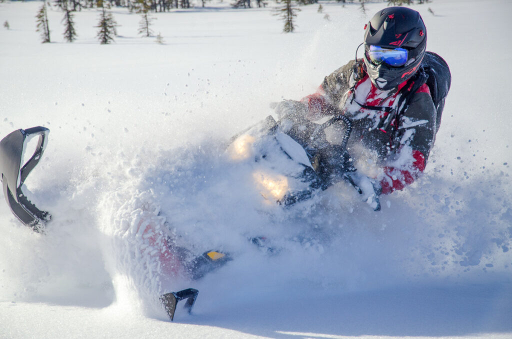 Backcountry snowmachine rider "sledder"