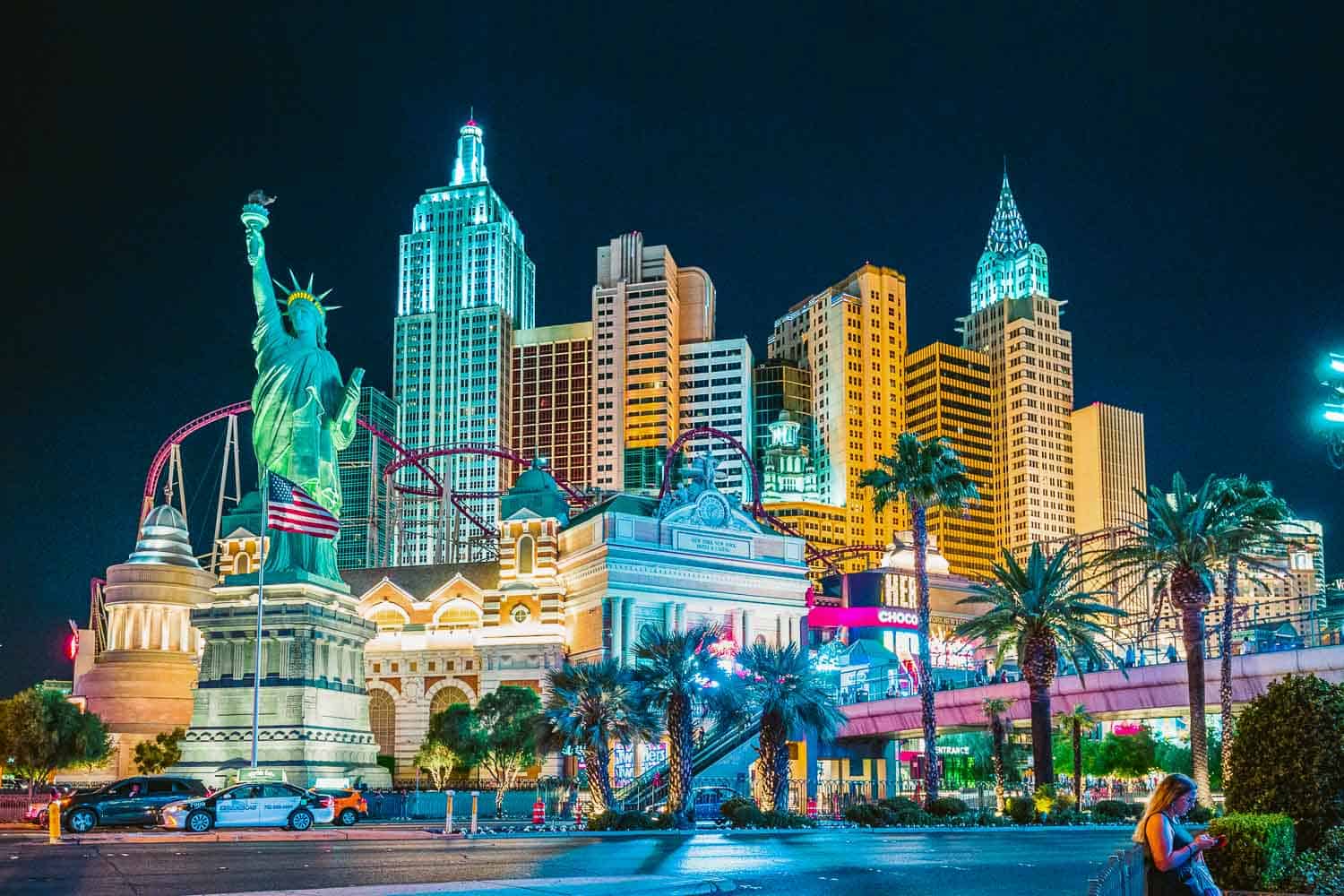 Colorful Downtown Las Vegas with world famous Strip and New York New York hotel and casino complex illuminated beautifully at night, Nevada, USA