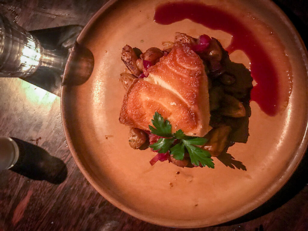 Decorated meat on plate on a food tour