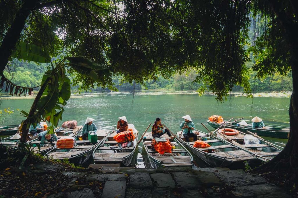 the boatman by the trans an boat tour in one of ninh binh's UNESCO sites