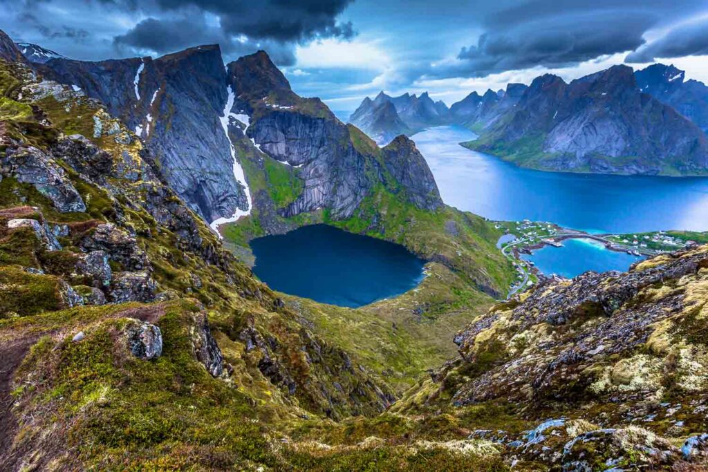 Panoramic view of the fishing town of Reine from the top of the Reinebringen viewpoint in the Lofoten Islands, Norway