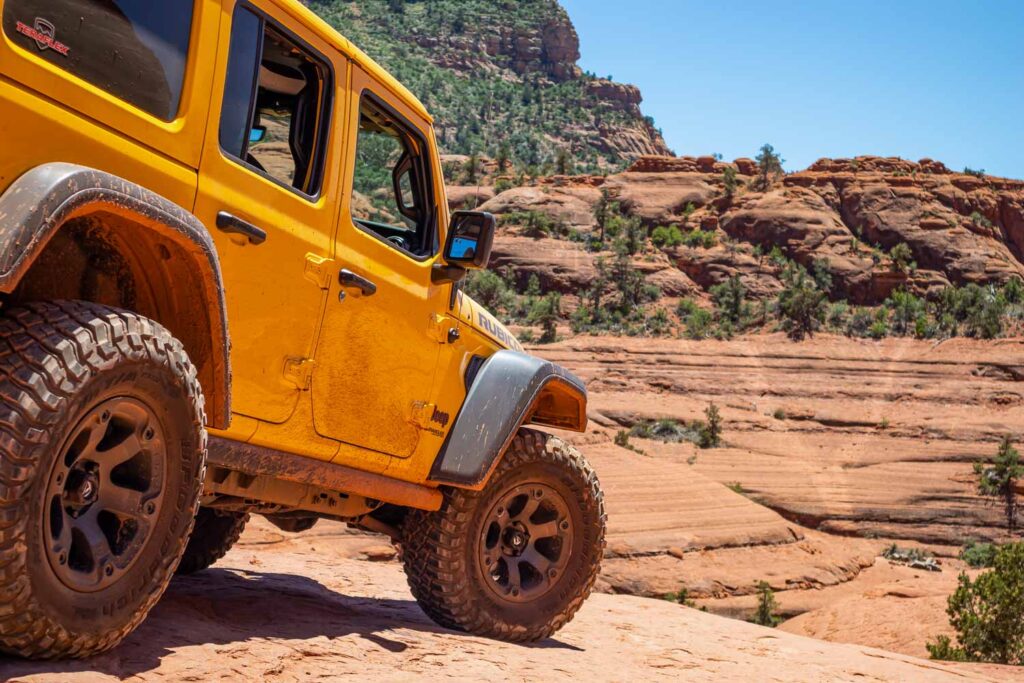 Sedona Arizona USA. 4 wheel drive on red orange rocks