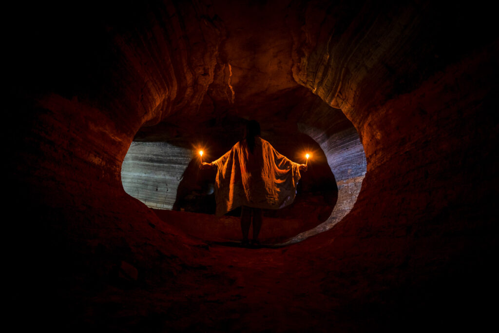 candle photoshoot in blue cave, one of the best things to do around sukhothai