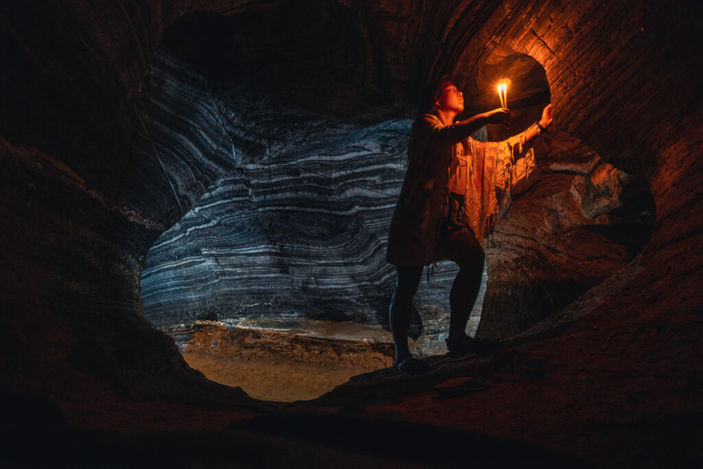 candle photoshoot in blue cave,