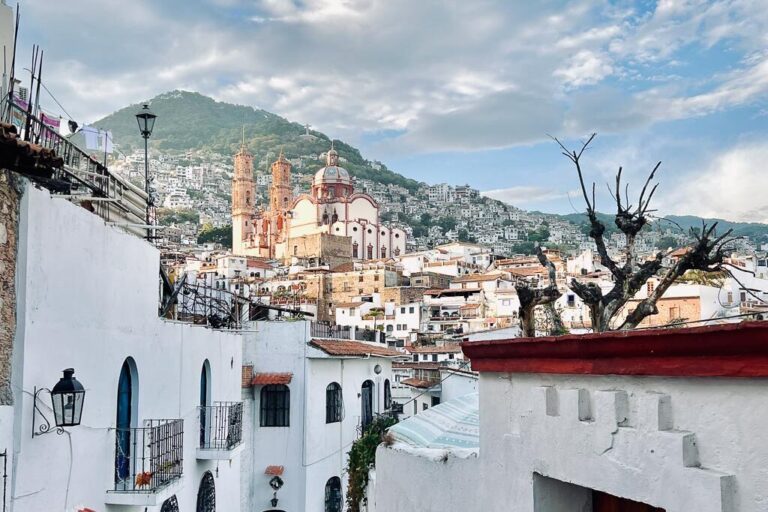 Sunlit church of the winding streets of Taxco