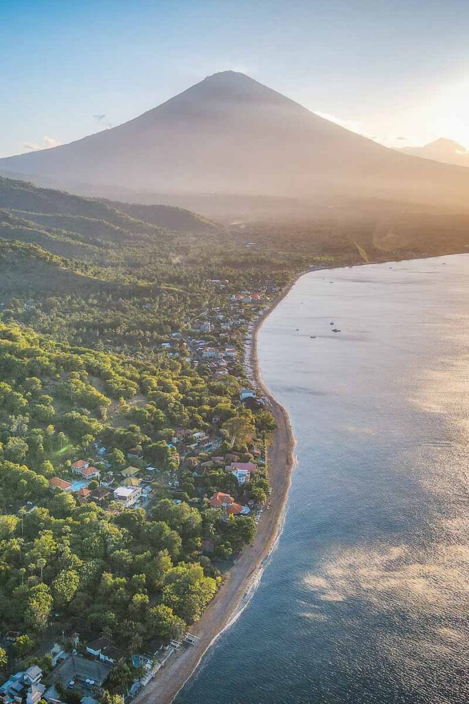 Sunrise on Mount Agung on the shoreline of Amed