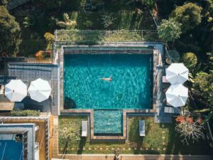 Sari Ater Infinity pool aerial of Nomadicated swimming