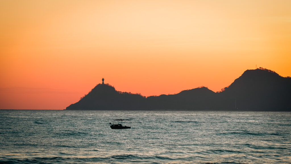 cristo rei of dili in the far distance, timor leste's most famous landmark