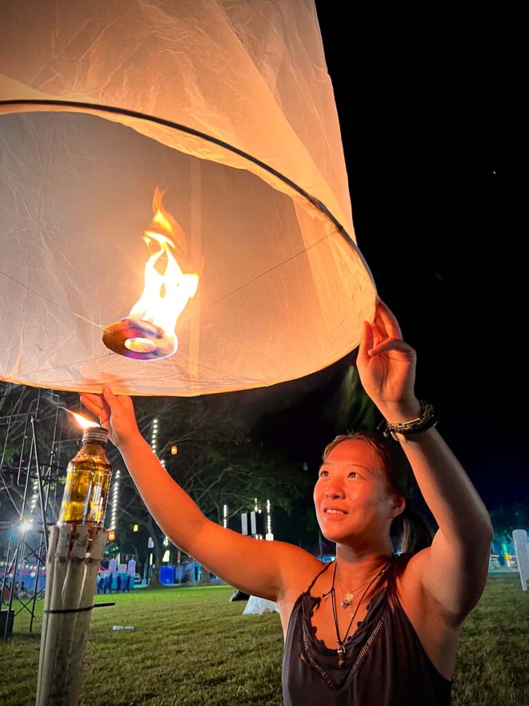 Nomadicated letting go of lantern in lantern festival in chiang mai, one of the best festivals of the year