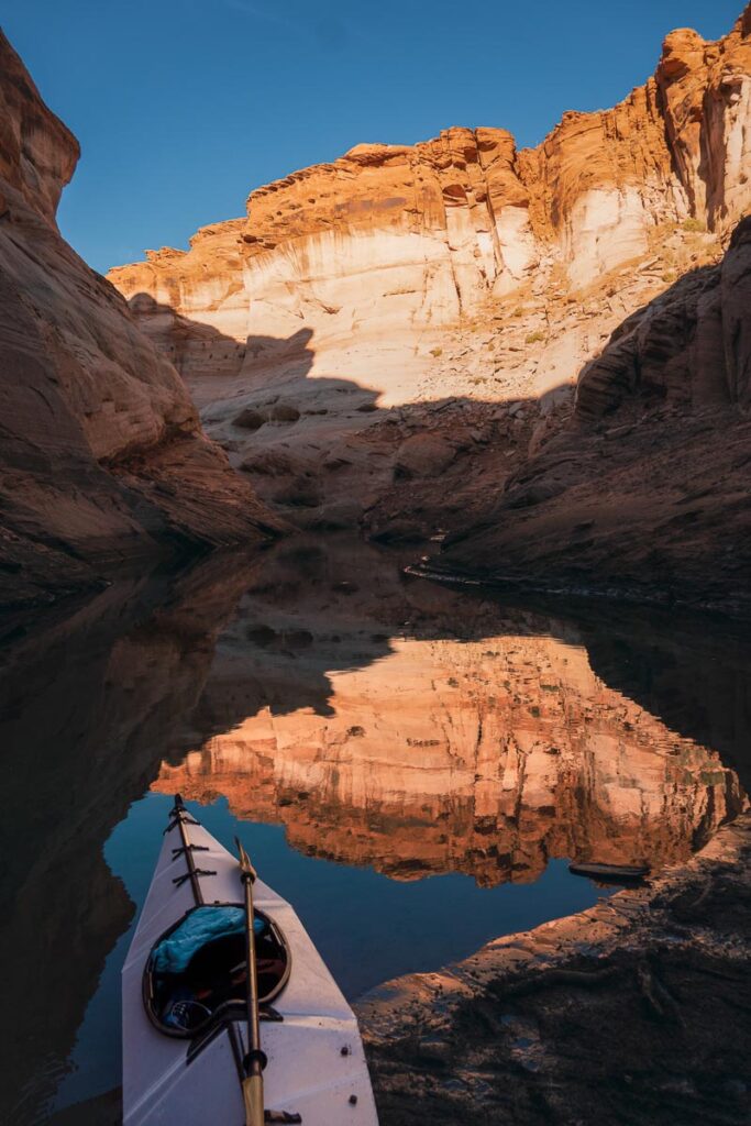 Kayaking Lake Powell sitting on the sand bank